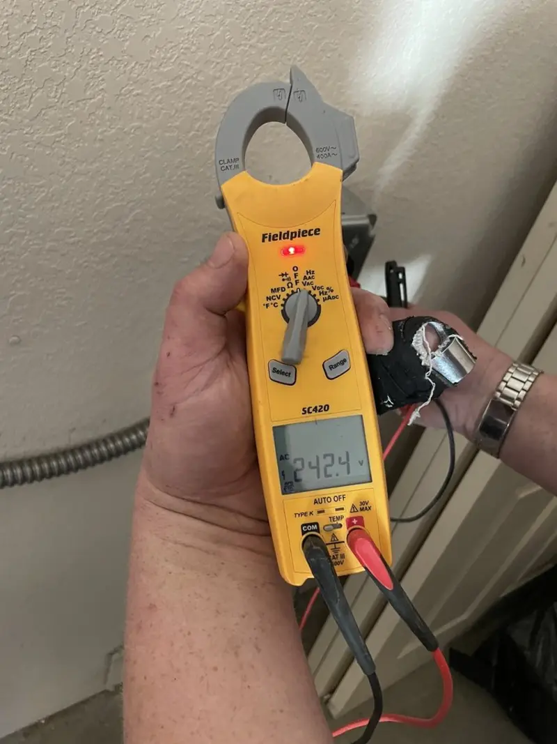 Voltage testing with clamp meter during Generator Installation in Rapid City